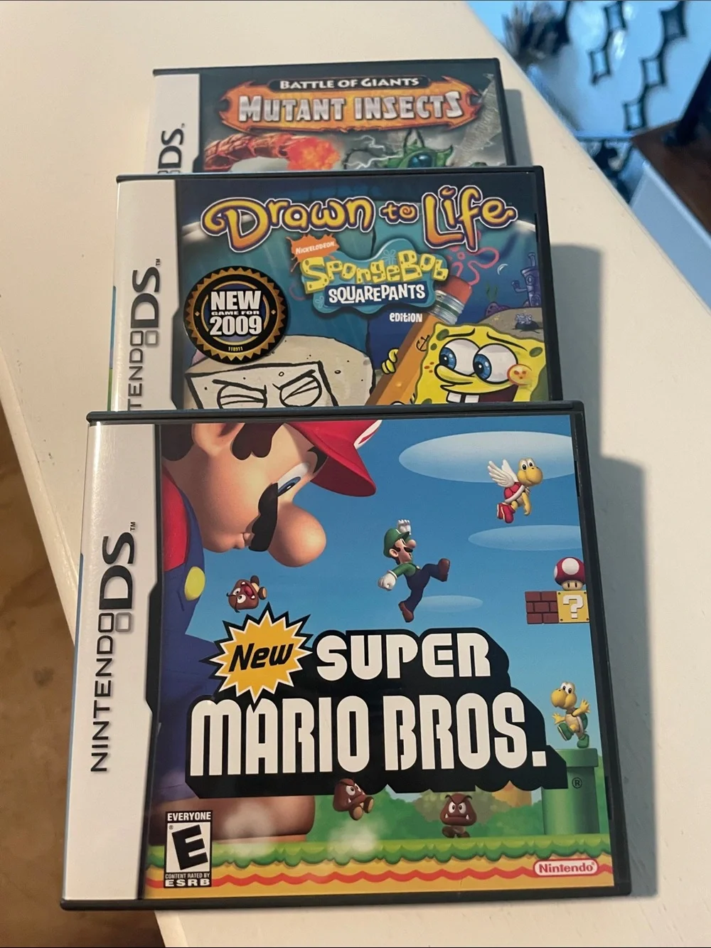 Nintendo DS Games - Super Mario Bros, SpongeBob, Mutant Insects